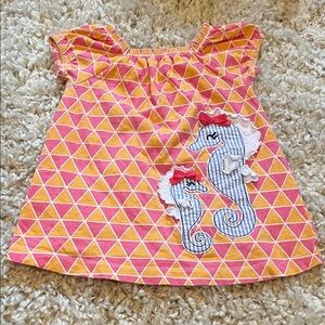 Nursery Rhyme Vibrant Seahorse Dress in Orange and Pink